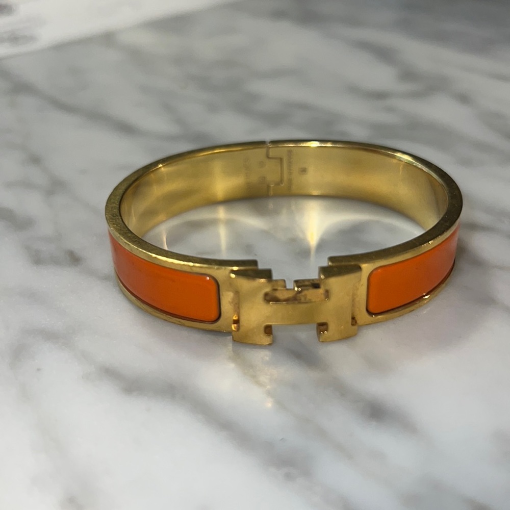 Orange and gold Hermes Clic H bracelet